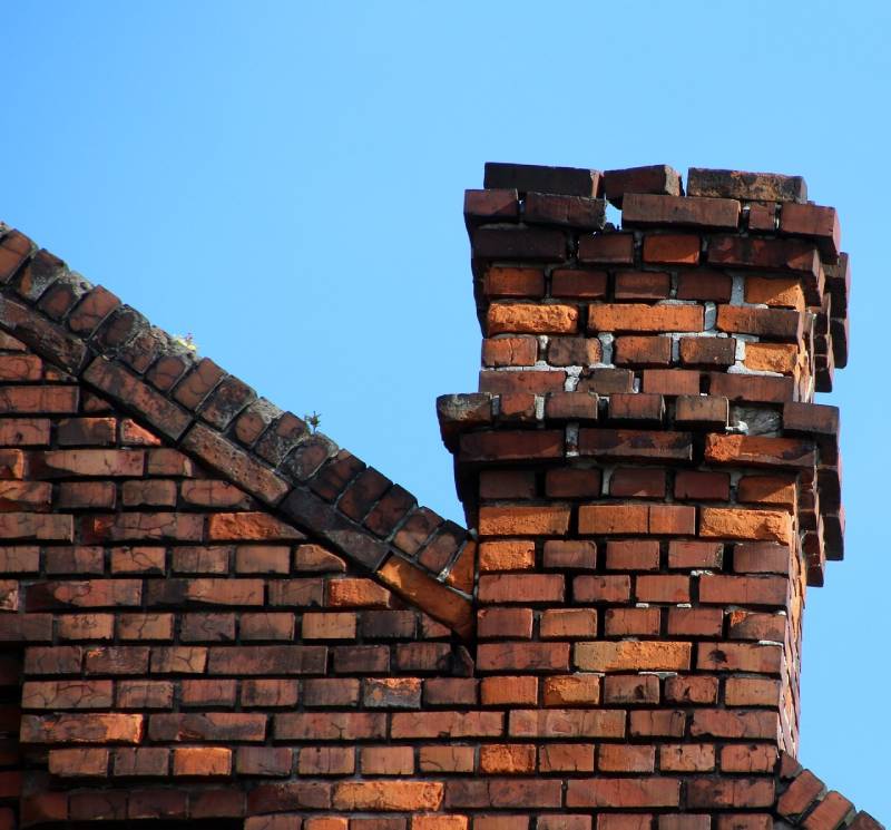 Blog Article - Damaged chimney on an Scituate home showing cracks and missing mortar